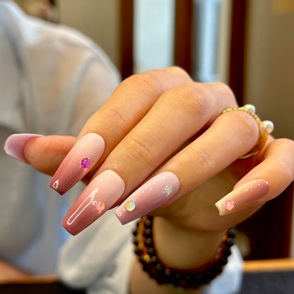 Gradient grape red nails with shiny colorful stones