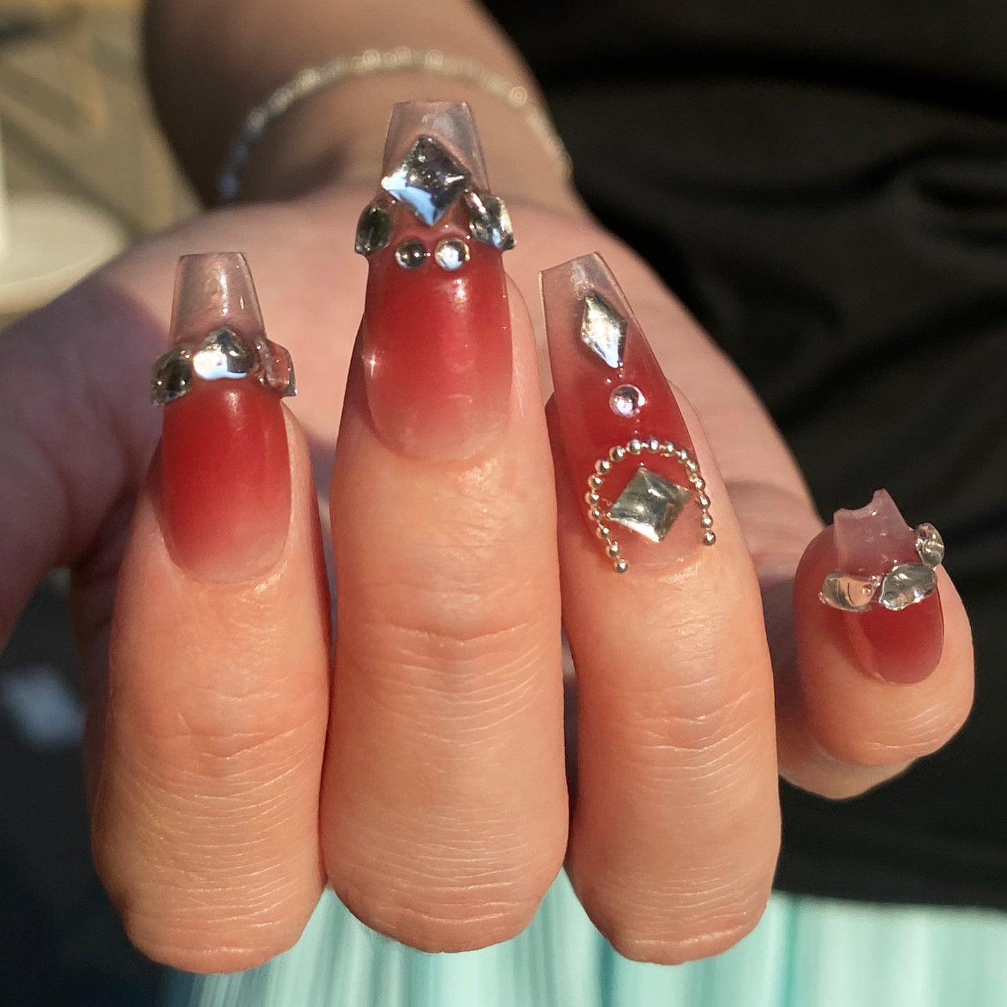 Red Gradient manicure in bling rhinestone and fake diamond