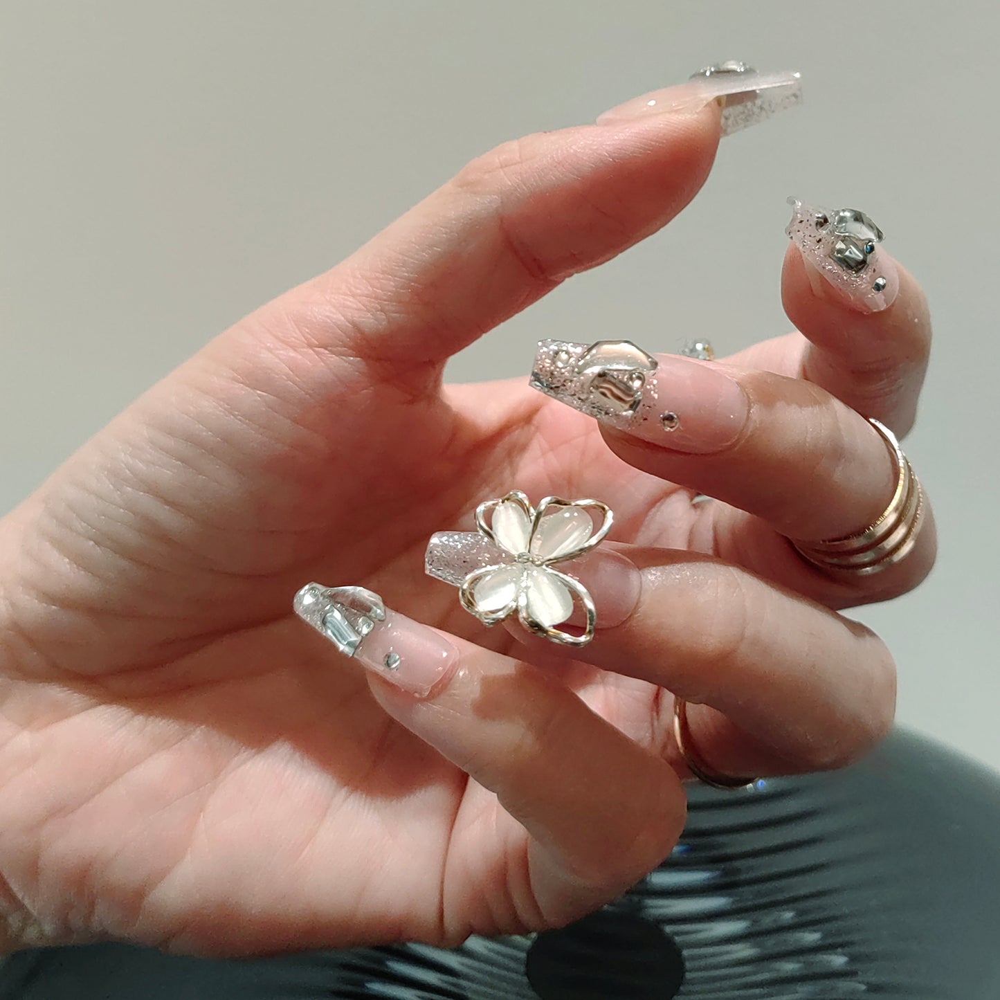 Transparent silvery white French tip with 3D butterfly